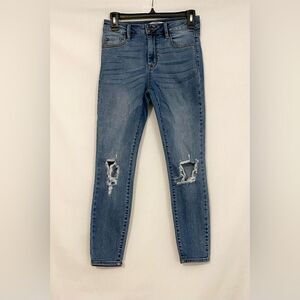 Carly Jean size 3 medium wash distressed skinny jeans.